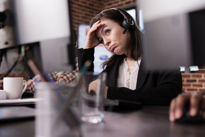 Businesswoman working at table