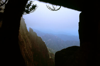 Scenic view of silhouette mountains against clear sky