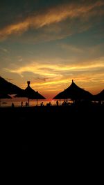 Scenic view of silhouette mountains against sky during sunset