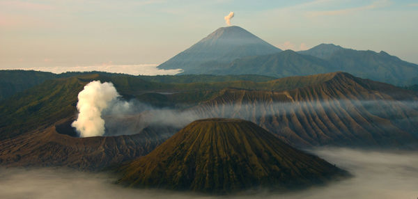 Volcano bromo bathed the light of sunrise, created beautiful color and texture of the landscape