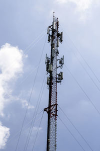 Mobile network antenna on blue sky background