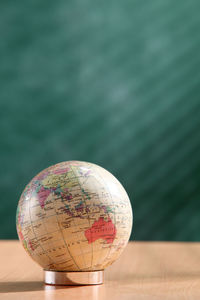 Close-up of globe on table