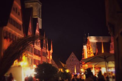 View of illuminated buildings at night