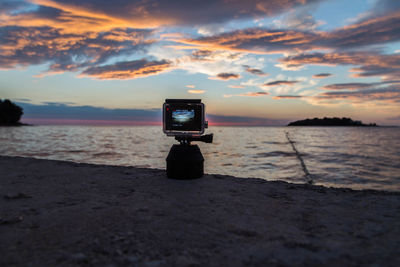 Scenic view of sea against sky during sunset