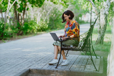 Young woman sitting on chair