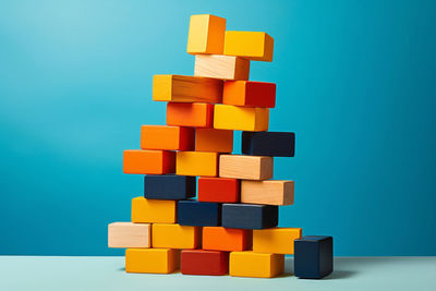 Close-up of toy blocks on blue background