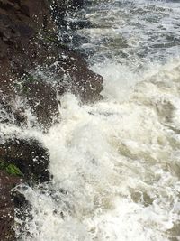 Waves splashing on rocks