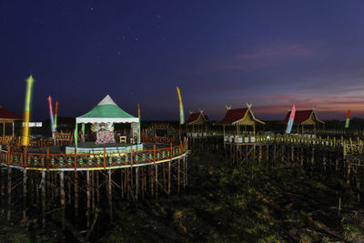 Panoramic view of beach against sky at night