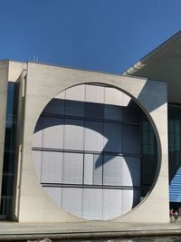 Modern building against clear blue sky