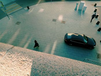 High angle view of people walking on street