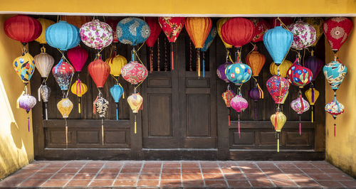 Multi colored lanterns hanging outside building