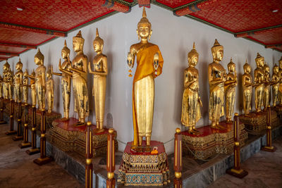 Statues in temple outside building