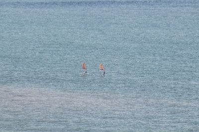 High angle view of people on sea