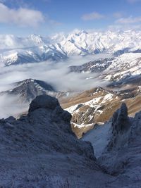 Scenic view of snowcapped mountains against sky