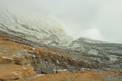 Gunung kawah ijen mountain sulphur crater scenery in banyuwangi, indonesia.