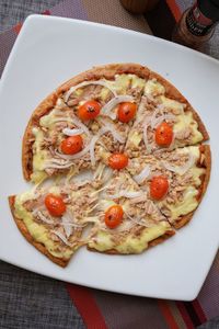 Close-up of pizza served in plate