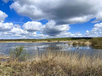 Scenic view of lake against sky