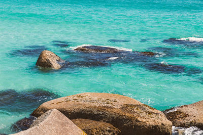 High angle view of rocks on beach