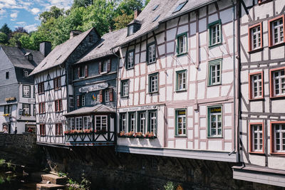 Houses by canal in city