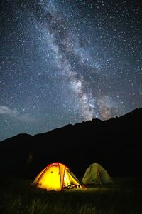 Tent against sky at night