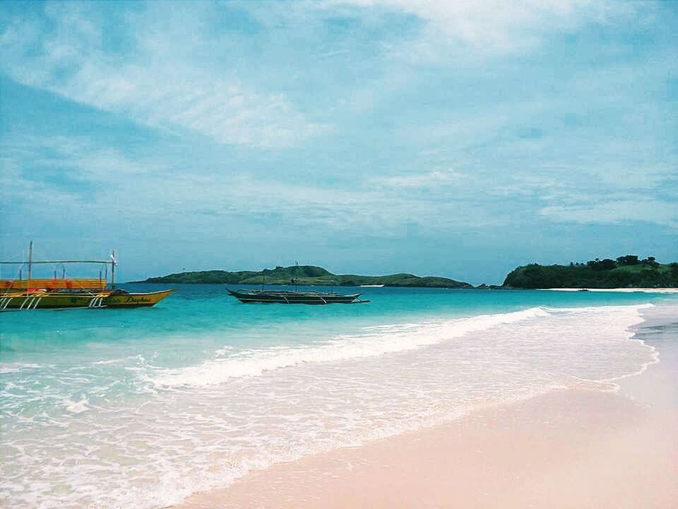 sea, water, beach, sky, horizon over water, shore, tranquil scene, scenics, tranquility, beauty in nature, sand, blue, cloud - sky, nature, wave, idyllic, cloud, nautical vessel, coastline, outdoors