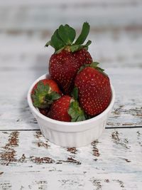 Close-up of strawberries in bowl on table