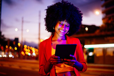 Young woman using mobile phone