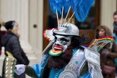 Close-up of person wearing mask and costume