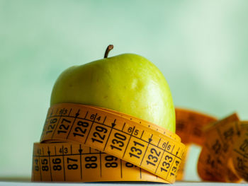 Close-up of apple against white background