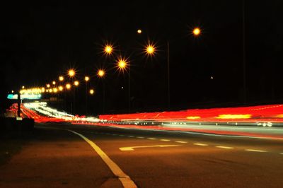 Light trails on road at night