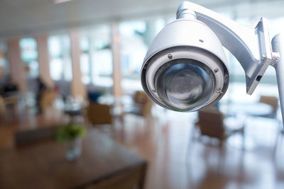 Close-up of security camera at coffee shop