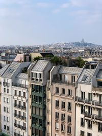 High angle view of buildings against sky