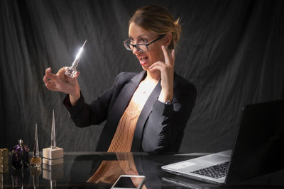 Young woman using mobile phone