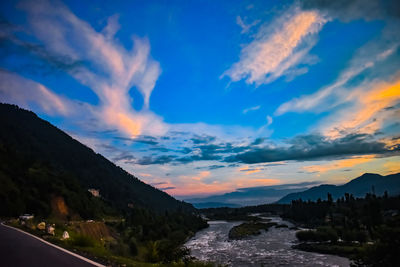 Scenic view of landscape against sky during sunset