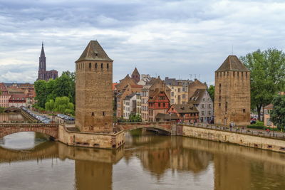 Vauban dam view in historical district by cloudy day, strasbourg, france