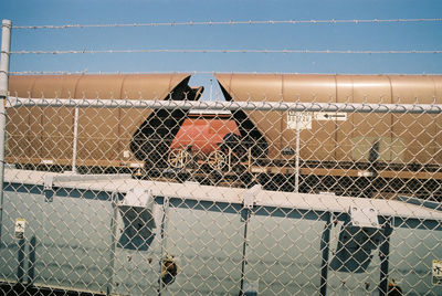 Chainlink fence against blue sky
