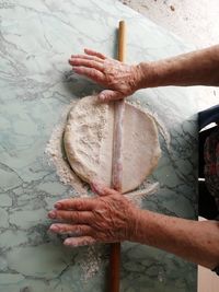 Close-up of man holding ice cream