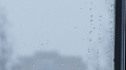 Close-up of water drops on glass