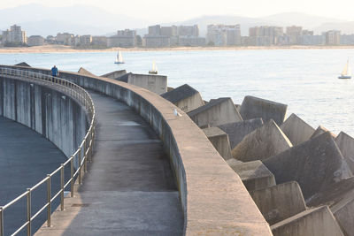 Bridge over sea in city