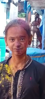 Portrait of happy woman in swimming pool