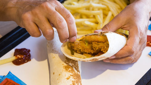 Midsection of man preparing food