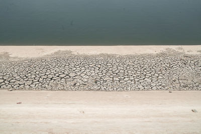 High angle view of stones on beach
