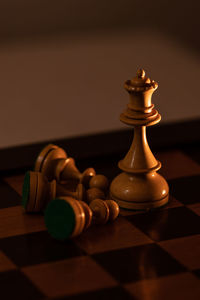 Close-up of chess pieces on table
