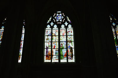 Low angle view of glass window in temple