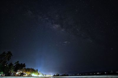 Scenic view of star field against sky at night