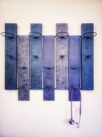 Directly above shot of woman against blue wall