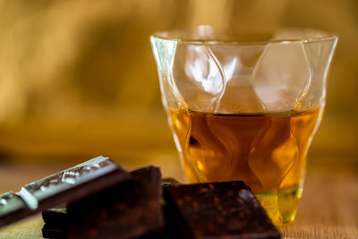 Close-up of tea in glass on table