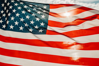 Close-up of flag against blue sky