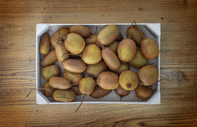 High angle view of fruits in box on table