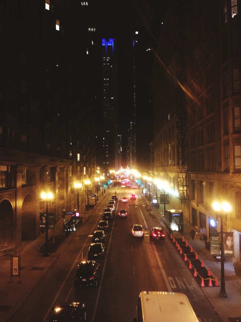 TRAFFIC ON CITY STREET AT NIGHT